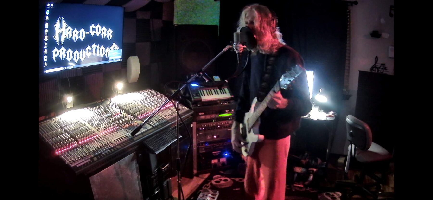 Tracking session under blue stage light at Hard-Corr Productions